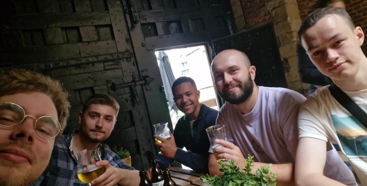The team at a pub during an in-person meetup